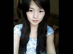 Cute chinese teen dancing on webcam